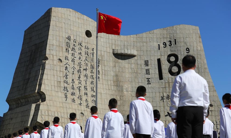 People attend a ceremony to commemorate the September 18 Incident and the Chinese People's War of Resistance against Japanese Aggression at the 9.18 Historical Museum in Shenyang, capital of northeast China's Liaoning Province, Sept. 18, 2022. (Xinhua/Yang Qing)
