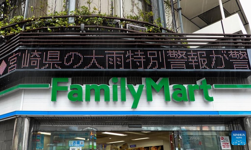 A weather alert display is seen in a street in Tokyo, Japan, Sept. 19, 2022. Two people were reported dead and another missing on Monday after powerful typhoon Nanmadol landed in Japan's southwestern region of Kyushu, bringing rain and gales, local media reported. (Xinhua/Zhang Xiaoyu)