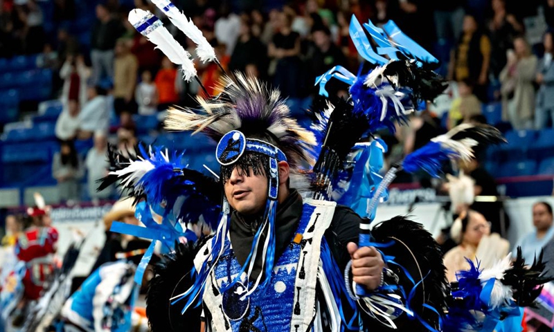 A dancer dressed in indigenous costume partakes in the Pow Wow's dance and celebrations at the Langley Events Centre in Langley, Canada, on Sept. 16, 2022.Photo:Xinhua