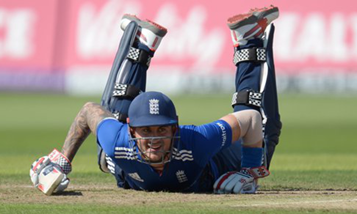 England's Alex Hales dives to prevent being run out during the third one-day international cricket match between England and Pakistan at the Trent Bridge Cricket Ground in Nottingham, England. Photo: AFP
