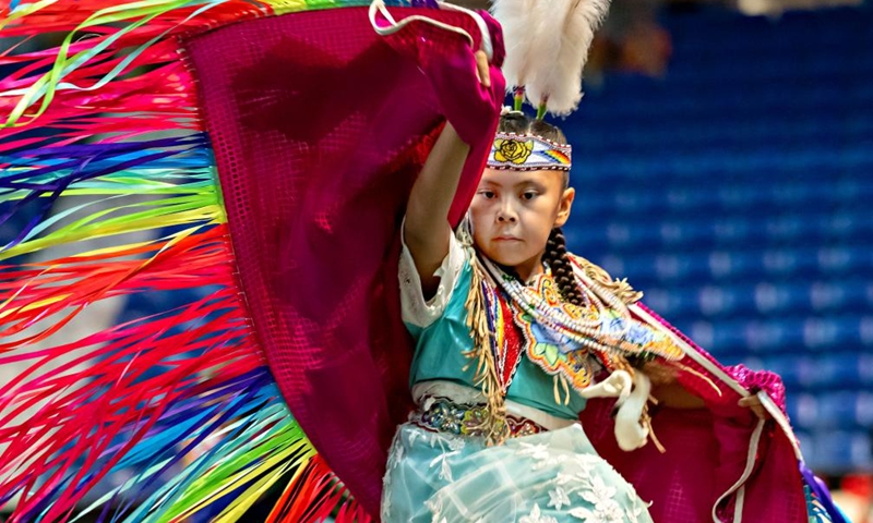 A dancer dressed in indigenous costume partakes in the Pow Wow's dance and celebrations at the Langley Events Centre in Langley, Canada, on Sept. 16, 2022.Photo:Xinhua