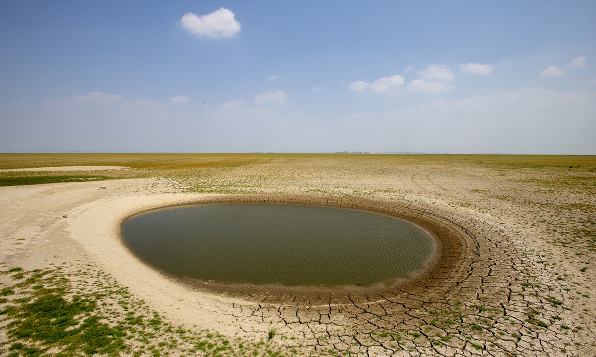 The dry Poyang Lake is seen in Jiujiang, East China's Jiangxi Province, on September 18, 2022. Jiujiang on September 17 issued a yellow alert as the water level of the largest freshwater lake in China kept dropping. Since July, Jiangxi has been suffering from high temperatures and little rain, with rainfall down by 60 percent year-on-year. Photo: VCG