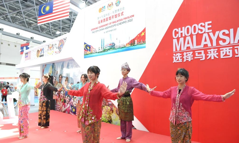 Performers dressed in folk costumes perform Malaysian dance during the opening ceremony of Malaysia pavilion of the 19th China-ASEAN Expo in Nanning, south China's Guangxi Zhuang Autonomous Region, Sept. 16, 2022.Photo:Xinhua