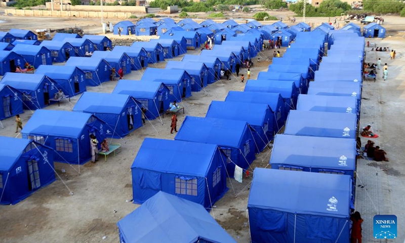 Makeshift tents of flood-affected people are seen on the outskirts of Hyderabad, Pakistan, Sept. 18, 2022.Photo:Xinhua