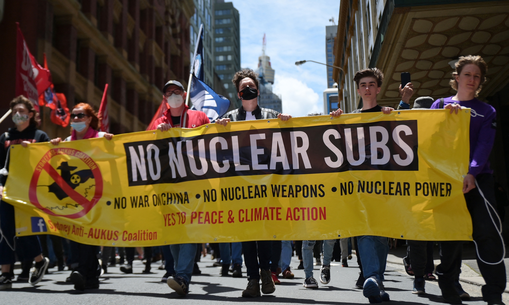Members of the Sydney Anti-AUKUS Coalition (SAAC) participate in a protest in Sydney, Australia, on December 11, 2021 against the nuclear submarines deal among AUKUS members. Photo: AFP