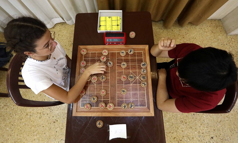 Participants compete in the game of Chinese chess, also called Xiangqi, organized by the XiangQi Committee in Lebanon in Bkenaya, Mount Lebanon Governorate, Lebanon, on Sept. 18, 2022.(Photo: Xinhua)