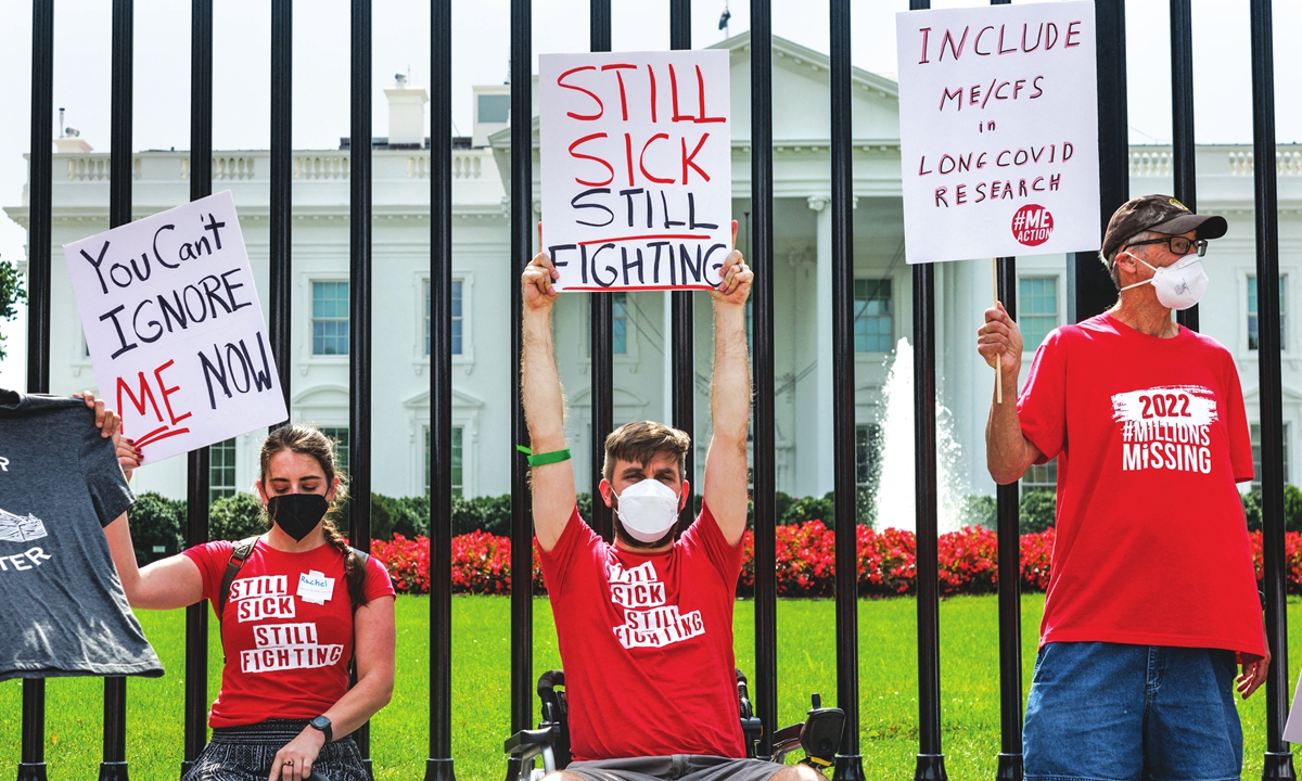 Demonstrators gather outside of the White House on September 19, 2022 to call for urgent governmental action for the millions of people living with long-term COVID, and other infection-associated, complex-chronic diseases. Photo: AFP