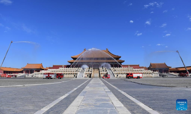 Photo taken on Sept. 19, 2022 shows a fire drill taking place at the Palace Museum, also known as the Forbidden City, in Beijing, capital of China. The drill was held to test and enhance fire prevention and emergency response capabilities at the ancient architectural complex.(Photo: Xinhua)
