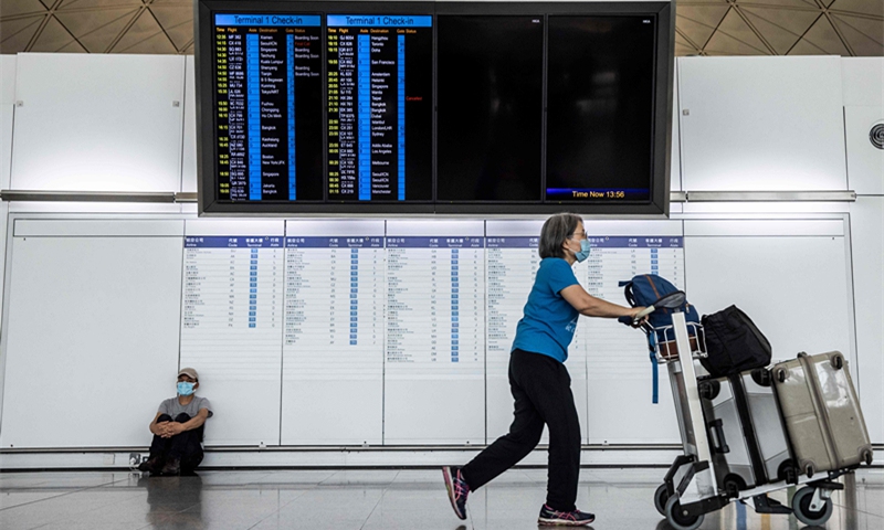 An electronic sign displays flight schedules at Hong Kong International Airport on September 23, 2022. Hong Kong announced on September 23 it will end mandatory hotel quarantine. Photo: VCG