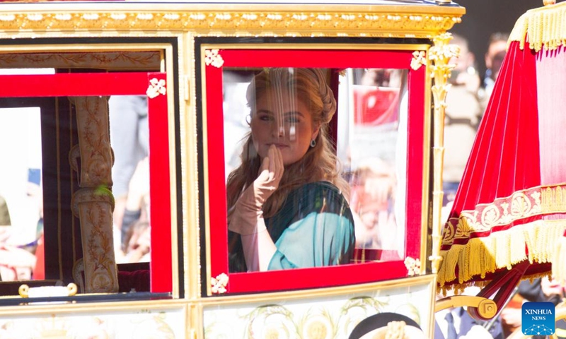 Princess Amalia of the Netherlands ride in the Glass Coach in the Hague, the Netherlands, on the Prince's Day, Sept. 20, 2022. The third Tuesday in September is Prince's Day in the Netherlands. It marks the opening of the Dutch parliamentary season, and on this day the reigning monarch outlines the government's plans for the year ahead.(Photo: Xinhua)