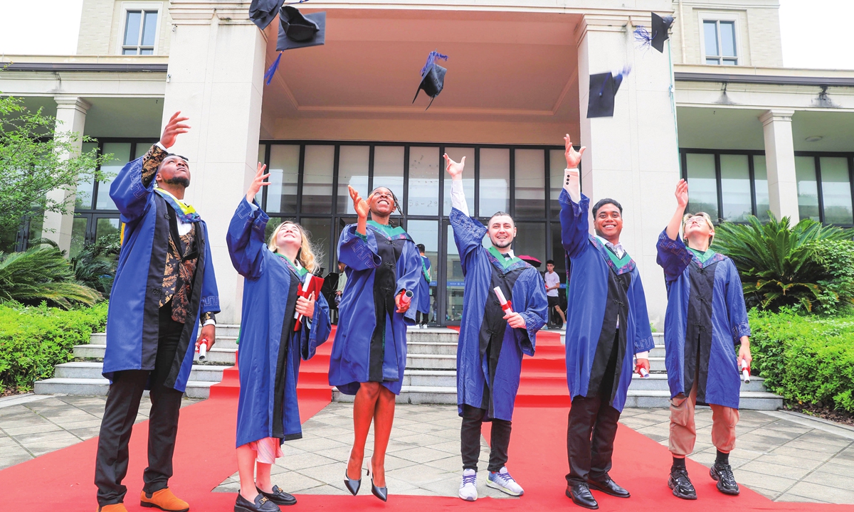 Students from different countries celebrate their graduation in a university in East China's Zhejiang Province on June 14, 2022. Photo: VCG