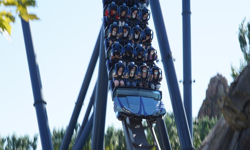 Visitors take a roller coaster at the Universal Beijing Resort in Beijing, capital of China, Sept. 20, 2022. The Universal Beijing Resort celebrated the one year anniversary of its opening to the public on Tuesday.(Photo: Xinhua)