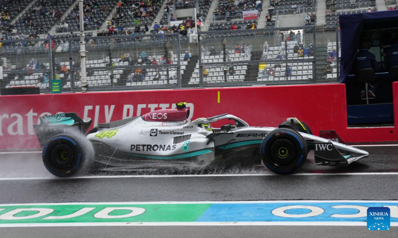 Mercedes' British driver George Russell drives in the rain during the first practice session of the Formula One Japan Grand Prix held at the Suzuka Circuit in Suzuka City, Japan, on Oct. 7, 2022. (Xinhua/Zhang Xiaoyu)