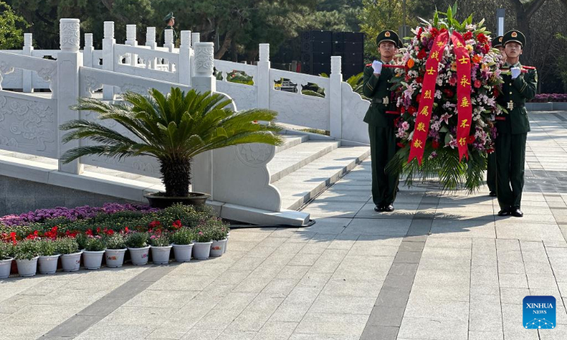 Flower baskets are presented as a tribute to martyrs during a commemorative event at the Chinese People's Volunteers (CPV) martyrs' cemetery in Shenyang, northeast China's Liaoning Province, Sept. 30, 2022. (Xinhua/Li Ang)