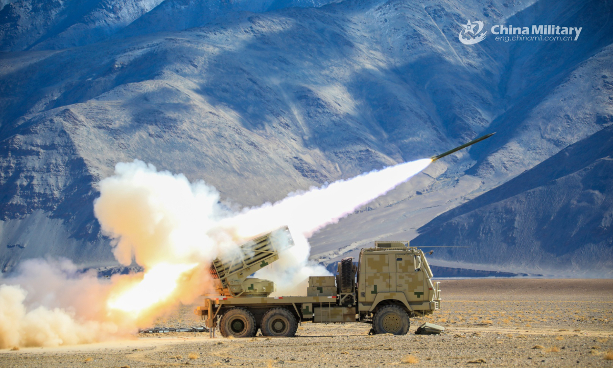 A truck-mounted artillery system attached to a regiment under the PLA Xinjiang Military Command fires at mock targets during a comprehensive live-fire training exercise in recent days. (eng.chinamil.com.cn/Photo by Chen Ming, Yang Yingbao, Chen Xi)