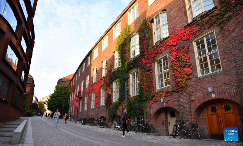 People walk at the KTH Royal Institute of Technology in Stockholm, Sweden, Oct. 7, 2022. (Xinhua/Ren Pengfei)