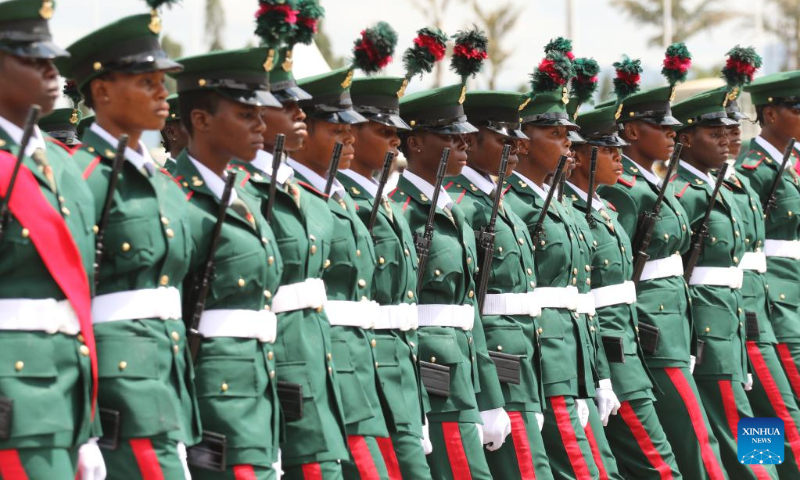 Photo taken on Oct. 1, 2022 shows soldiers participating in a parade marking Nigeria's Independence Day in Abuja, Nigeria. (Photo by Emma Houston/Xinhua)