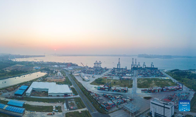 Aerial panoramic photo taken on Sept. 25, 2022 shows the Yangpu international container port at Yangpu economic development zone, south China's Hainan Province. As a state-level development zone established in 1992 in the northwest of Hainan, the Yangpu Economic Development Zone is a pioneer and demonstration area for the Hainan Free Trade Port. (Xinhua/Pu Xiaoxu)