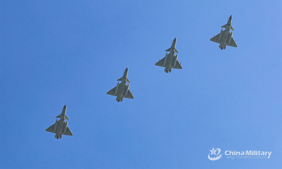 Four fighter jets attached to an aviation brigade under the PLA Southern Theater Command fly in an echelon formation during a flight training exercise on September 8, 2022. Photo:China Military