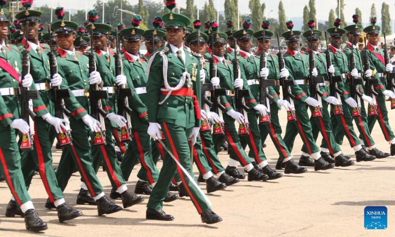 Photo taken on Oct. 1, 2022 shows soldiers participating in a parade marking Nigeria's Independence Day in Abuja, Nigeria. (Photo by Emma Houston/Xinhua)