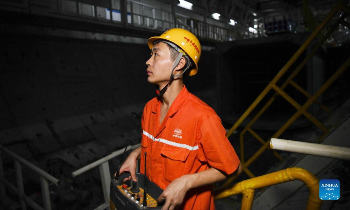 A staff member works at the construction site of a tunnel across the Yangtze River in Wuhu, east China's Anhui Province, Oct. 3, 2022. (Xinhua/Zhang Duan)
