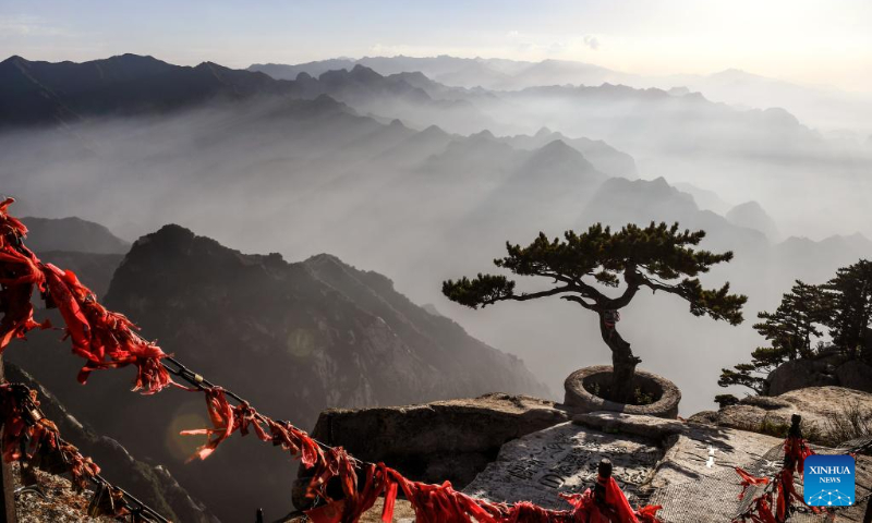 Aerial photo taken on Sept. 25, 2022 shows the view of Mount Huashan at sunset in northwest China's Shaanxi Province. (Photo by Zou Jingyi/Xinhua)