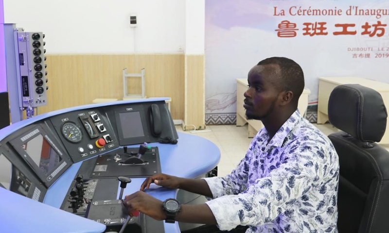 A student shows a train driving simulator at the Djibouti Luban Workshop at Djibouti Industrial and Commercial School in Djibouti City, capital of Djibouti, on Sept. 19, 2022.Photo:xinhua
