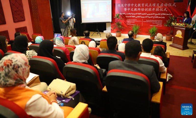 Photo shows the scene of the launching ceremony of a pilot program for teaching the Chinese language in Egyptian middle schools and a training program for Egyptian teachers at the Confucius Institute of Cairo University in Cairo, Egypt, Sept. 25, 2022.Photo:Xinhua