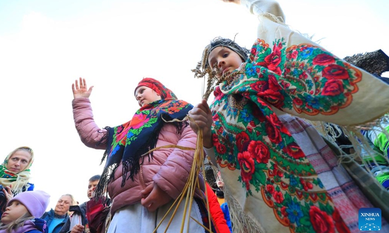 People attend a celebration of a bumper harvest in the suburb of Minsk, Belarus, Sept. 25, 2022.Photo:Xinhua