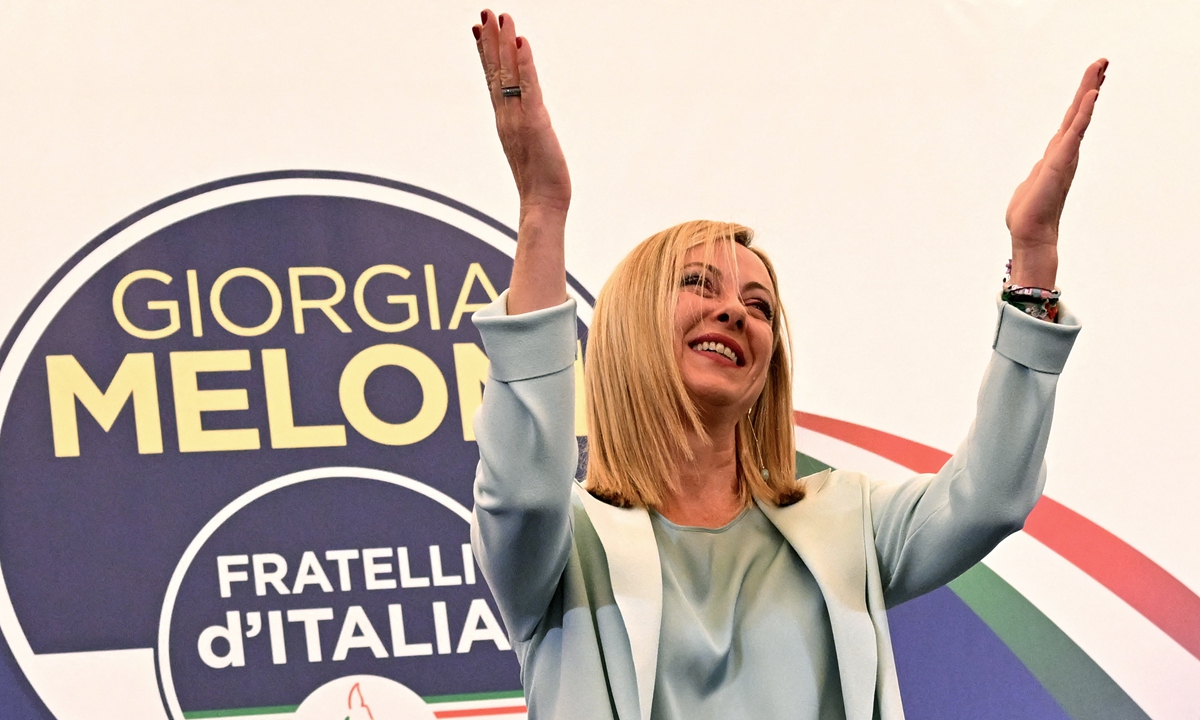 Leader of Italian far-right party Fratelli d'Italia (Brothers of Italy), Giorgia Meloni acknowledges the audience after she delivered an address at her party's campaign headquarters overnight on September 26, 2022 in Rome, after the country voted in a legislative election.Photo: AFP
