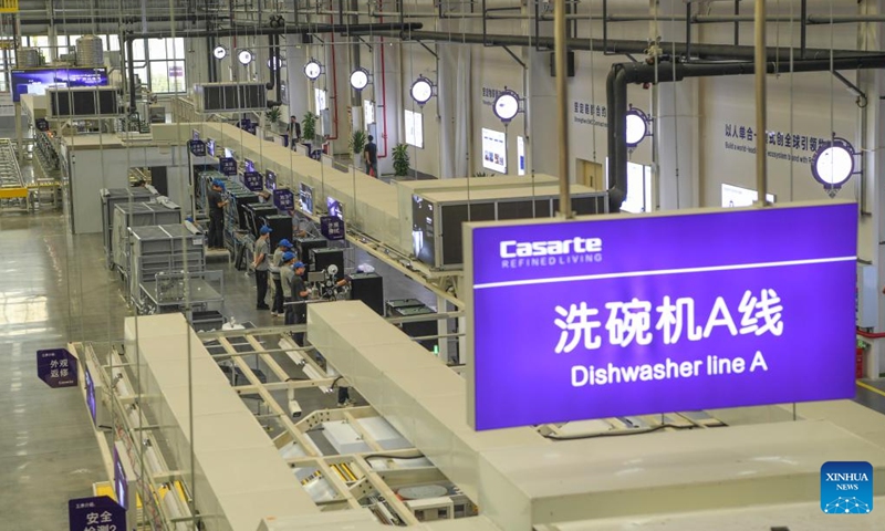 Photo taken on Sept. 25, 2022 shows the production line of a dishwasher interconnected factory of Chongqing Haier Washing Electric Appliances Co.LTD in southwest China's Chongqing.Photo:Xinhua