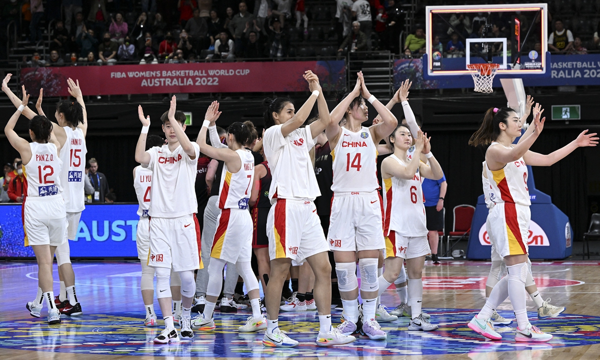 Team China celebrate their victory after the Women's Basketball World Cup Group A game between China and Belgium in Sydney, Australia on September 27, 2022. Photo: AFP