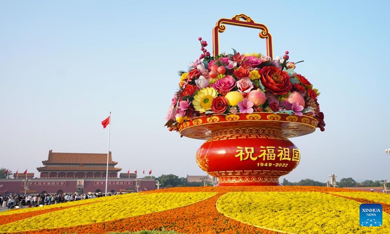 Photo taken on Sept. 25, 2022 shows a flower basket at Tian'anmen Square in Beijing, capital of China. The 18-meter-tall display in the shape of a flower basket is placed at Tian'anmen Square as a decoration for the upcoming National Day holiday.(Photo: Xinhua)