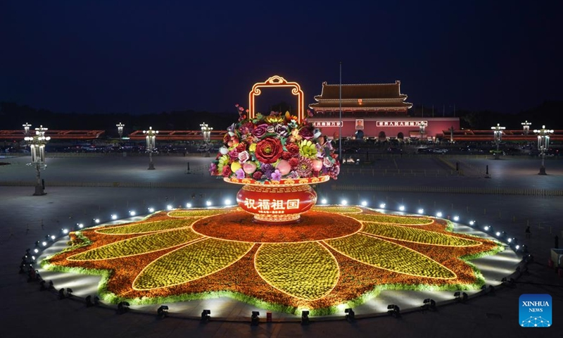 Photo taken on Sept. 25, 2022 shows a flower basket at Tian'anmen Square in Beijing, capital of China. The 18-meter-tall display in the shape of a flower basket is placed at Tian'anmen Square as a decoration for the upcoming National Day holiday.(Photo: Xinhua)