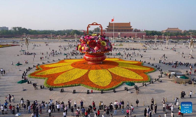 Photo taken on Sept. 25, 2022 shows a flower basket at Tian'anmen Square in Beijing, capital of China. The 18-meter-tall display in the shape of a flower basket is placed at Tian'anmen Square as a decoration for the upcoming National Day holiday.(Photo: Xinhua)
