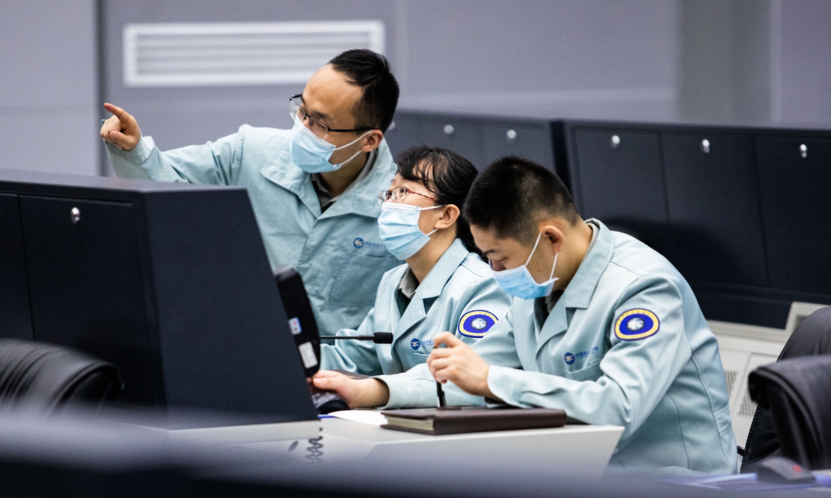 Staffers at the Xi'an Satellite Control Center work to rescue the BDS-3 GEO-2 satellite in March 2021. Photo: Courtesy of Xi'an Satellite Control Center
