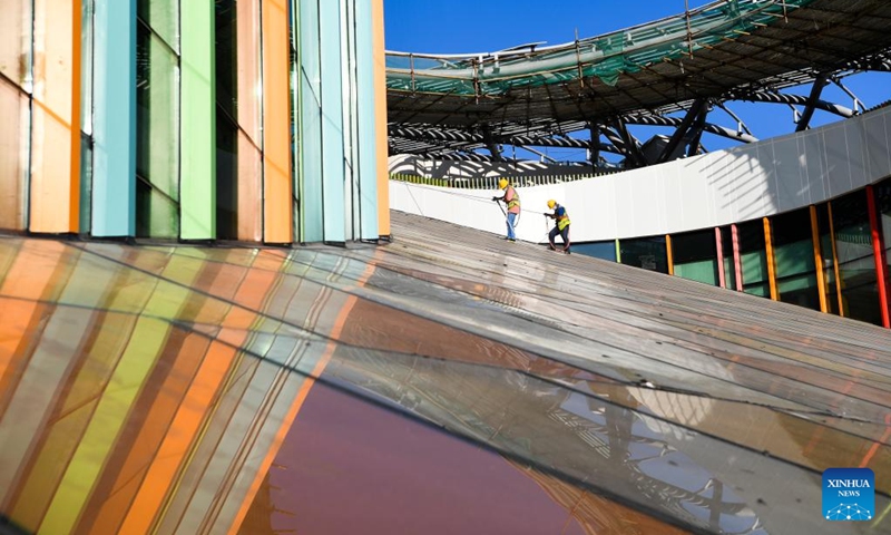 Workers work at the construction site of a youth activity center in southwest China's Chongqing Municipality, Sept. 29, 2022. The construction of a youth activity center, covering an area of about 150 mu (10 hectares), went smoothly in Chongqing. (Xinhua/Wang Quanchao)
