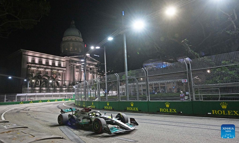 Mercedes' British driver Lewis Hamilton drives during the second practise session of the Formula One Singapore Grand Prix Night Race at the Marina Bay Street Circuit in Singapore on Sept. 30, 2022. (Photo by Then Chih Wey/Xinhua)
