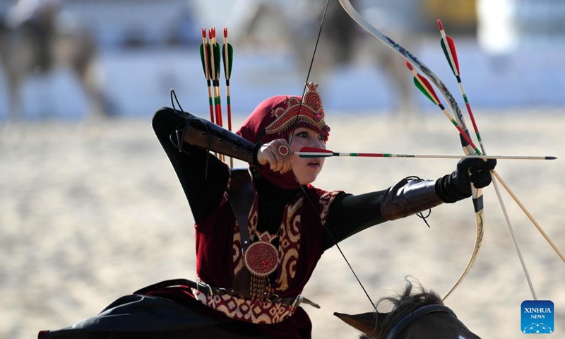 A contestant shows her horseback archery skills during the 4th World Nomad Games in Iznik, Türkiye, Sept. 30, 2022. (Xinhua/Shadati)