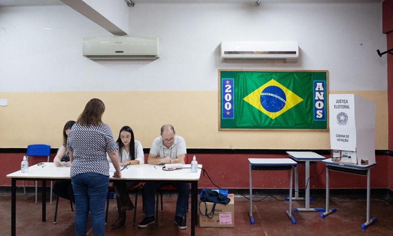 A woman casts her vote at a polling station in Rio de Janeiro, Brazil, Oct. 2, 2022. (Xinhua/Wang Tiancong)