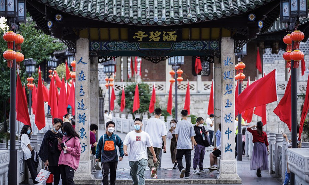 People visit Jiaxiu Pavilion in Guiyang, capital of southwest China's Guizhou Province, Oct. 1, 2022.(Xinhua/Tao Liang)