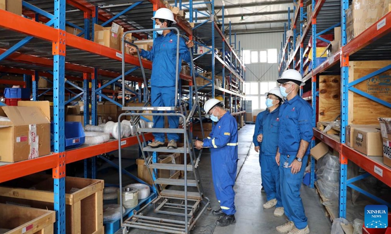 Employees of PetroChina work at a depot of the Halfaya oil field in Maysan province, Iraq, on Sept. 24, 2022. Photo: Xinhua