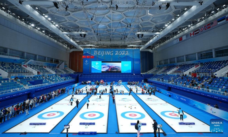 People visit the National Aquatics Center, also known as the Ice Cube, in Beijing, capital of China, April 16, 2022.Photo:Xinhua