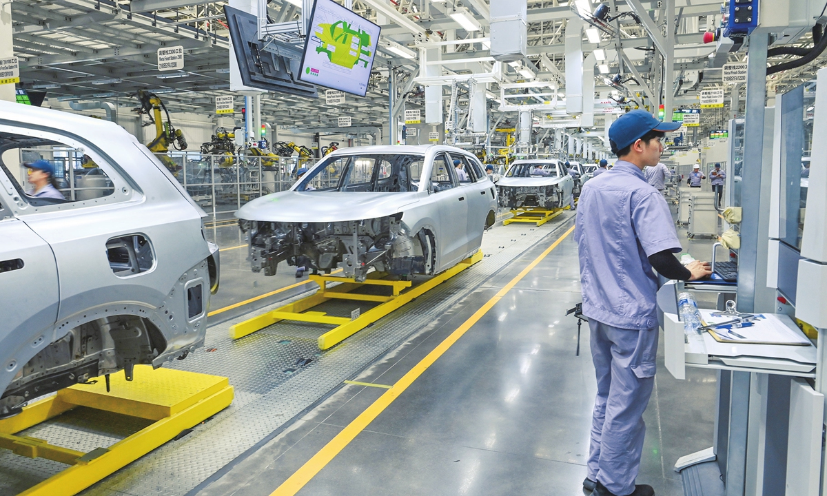 The<strong>custom embossed tins company</strong> manufacturing line of a NEV factory in Southwest China's Chongqing Municipality Photo: VCG