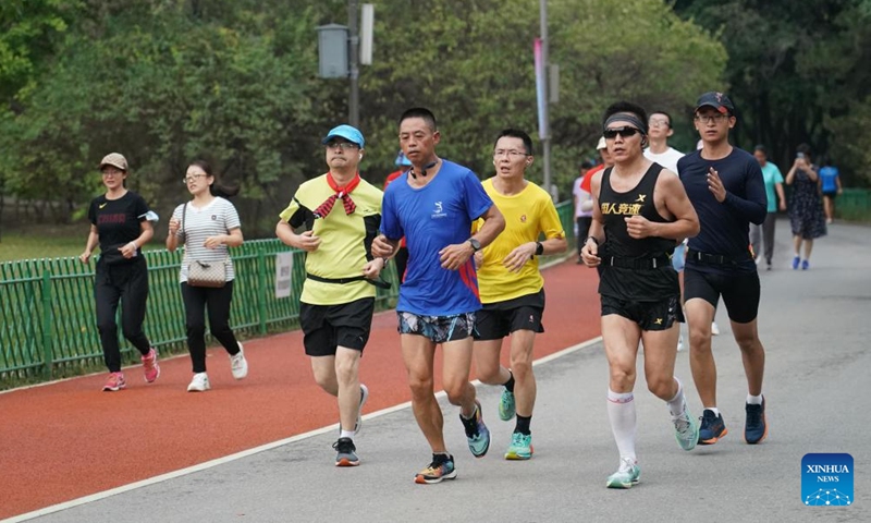 People run at the Olympic Forest Park in Beijing, capital of China, Sept 11, 2022.Photo:Xinhua