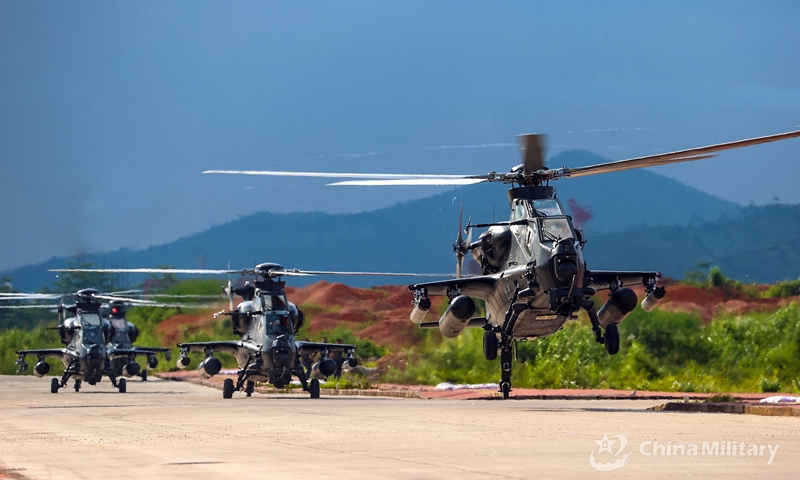 Attack helicopters attached to an army aviation brigade under the PLA Eastern Theater Command lift off in turn for a flight training exercise on September 14, 2022.Photo:eng.chinamil.com.cn