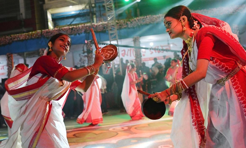 Dancers perform during Durga Puja carnival in Agartala, the capital city of Tripura, northeastern India, on Oct. 7, 2022.Photo:Xinhua
