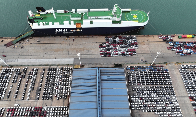 A roll-on, roll-off vessel loads vehicles for export at a port in Lianyungang, East China's Jiangsu Province on October 9, 2022. In September, the port of Lianyungang exported 26,000 machines and vehicles, the highest monthly number on record. Photo: VCG