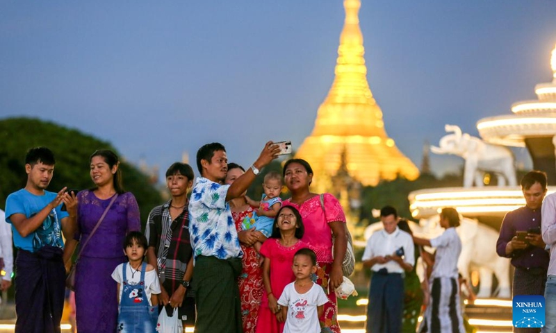 People visit a park during the Thadingyut lighting festival in Yangon, Myanmar, Oct. 9, 2022.(Photo: Xinhua)