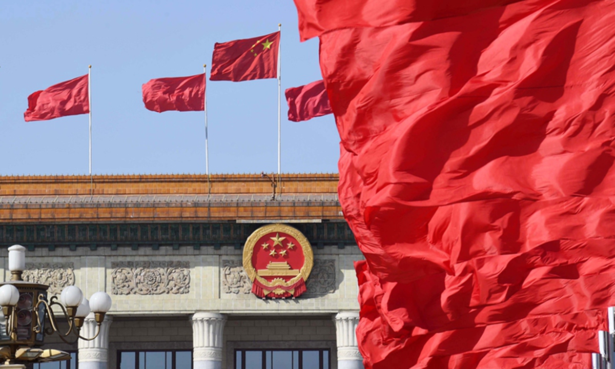 Flags at the Tian'anmen Square and atop the Great Hall of the People in Beijing.(Photo: Xinhua)